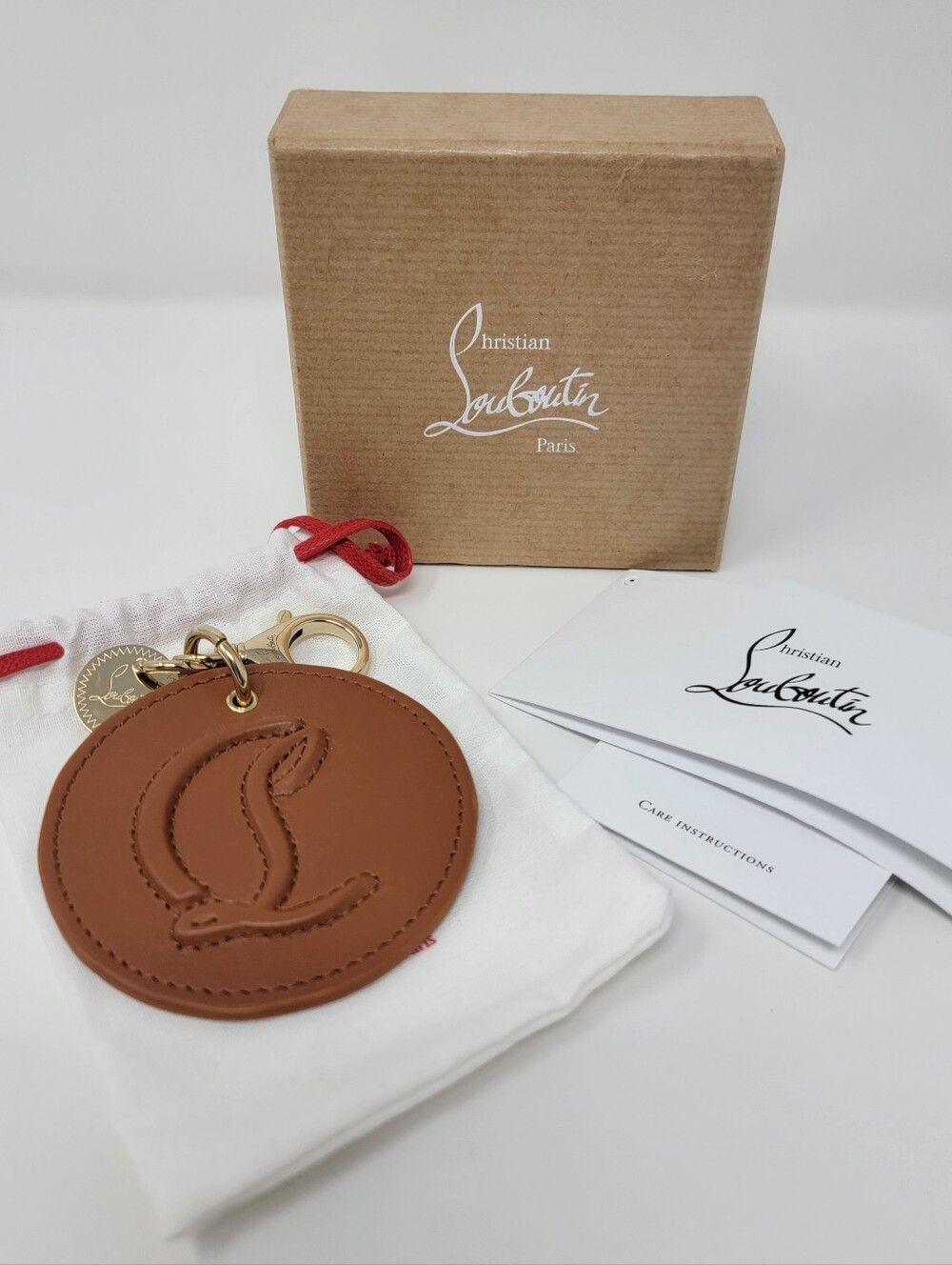 Unused Christian Louboutin Round Leather Logo Bag Charm